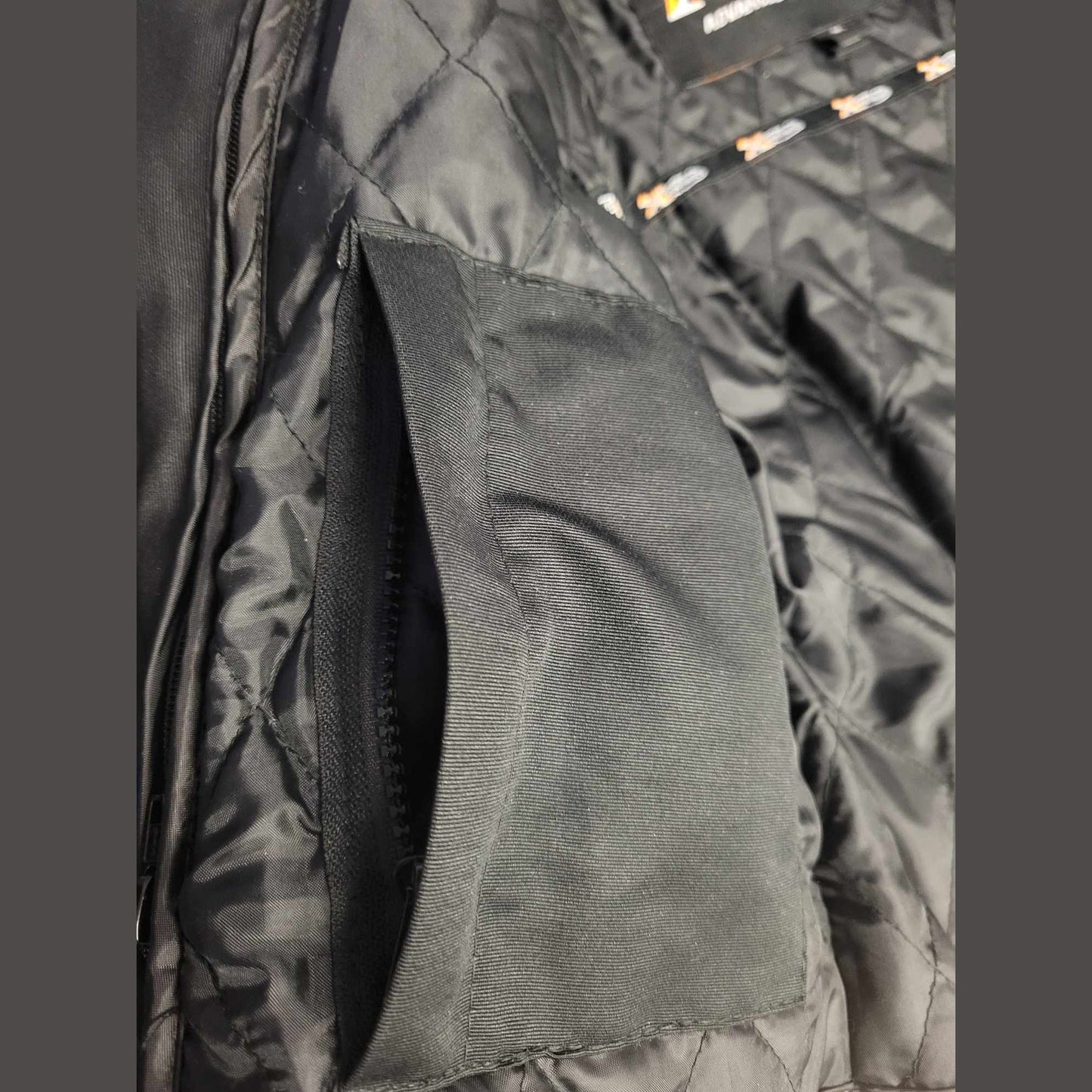 Ladies Black Textile Armored Cordura Motorcycle Jacket view of pockets