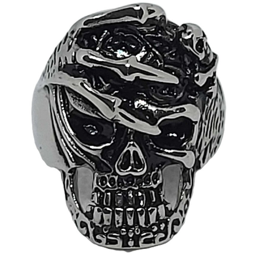 Skull with skeleton hand ring