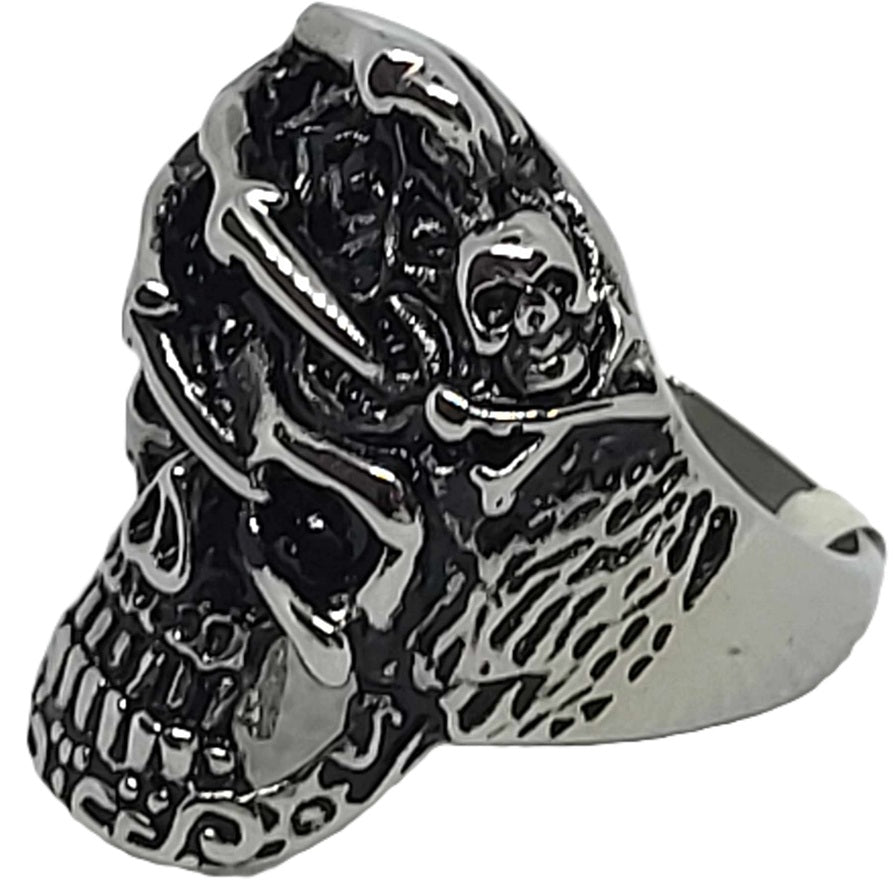 Skull with skeleton hand ring